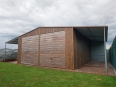 garaz-blaszany-dwustanowiskowy-z-wiatami-12x7,5m-orzech-3.jpg